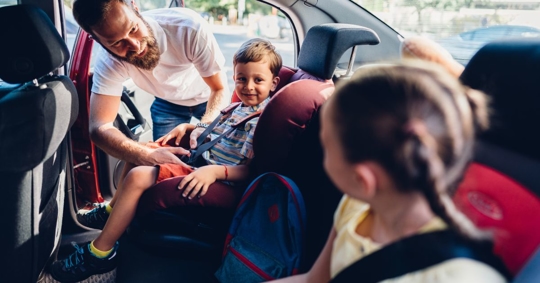 family in car