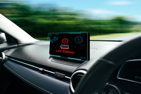 Low battery caution display on screen of a car malfunction, The battery voltage signal is dropping and low on car multimedia screen of EV electric vehicle car, EV electric vehicle technology concept.